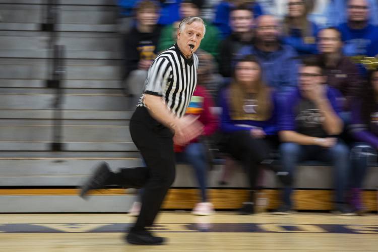 Referee Peter DePalo runs down the court during the NHIAA Division III boys basketball semifinal game between Conant High School and Kearsarge Regional High School held at Bow High School in Bow, N.H., on Tuesday, Feb. 20, 2024. (Valley News / Report For America - Alex Driehaus) Copyright Valley News. May not be reprinted or used online without permission. Send requests to permission@vnews.com.