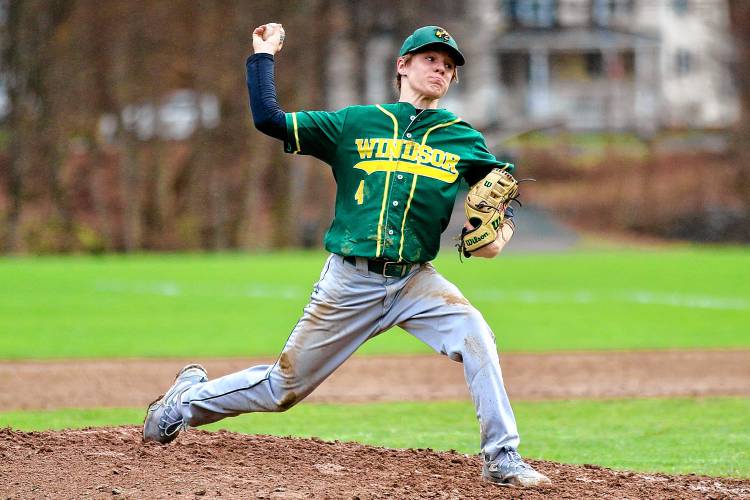 Windsor High's Alden Weld delivers a pitch against Hartford during his team's 18-0 loss on April 15, 2024, in Windsor, Vt. (Valley News - Tris Wykes) Copyright Valley News. May not be reprinted or used online without permission. 