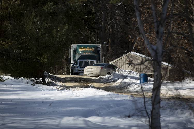 A Vermont State Police major crime unit vehicle is parked outside of a residence while the crime scene search team conducts an investigation in a suspicious missing-persons case on Old Post Road in Bradford, Vt., on Wednesday, Feb. 5, 2025. (Valley News - Alex Driehaus)