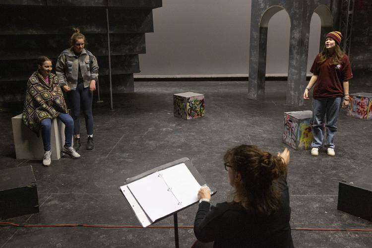 Director Amanda Rafuse, center, gives feedback to actors, from left, Isabella Doubleday, 14, of Hanover, N.H., Catherine Anderson, 15, of Hanover, and Sara Garr, 15, of Norwich, Vt., during a rehearsal of “I’m Fine” at Hanover High School in Hanover on Saturday, Jan. 27, 2024. (Valley News / Report For America - Alex Driehaus) Copyright Valley News. May not be reprinted or used online without permission. Send requests to permission@vnews.com.