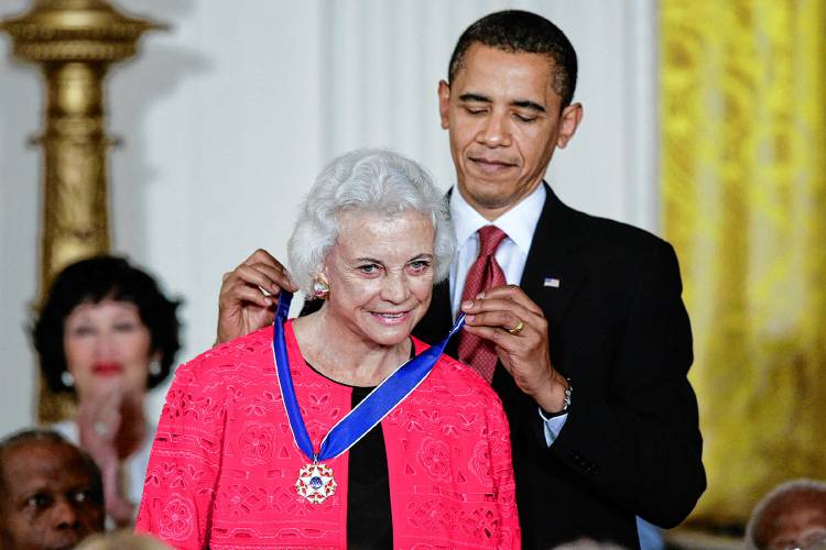 FILE - President Barack Obama presents the 2009 Presidential Medal of Freedom to Sandra Day O'Connor, Aug. 12, 2009. O'Connor, who joined the Supreme Court in 1981 as the nation's first female justice, has died at age 93. (AP Photo/J. Scott Applewhite, File)