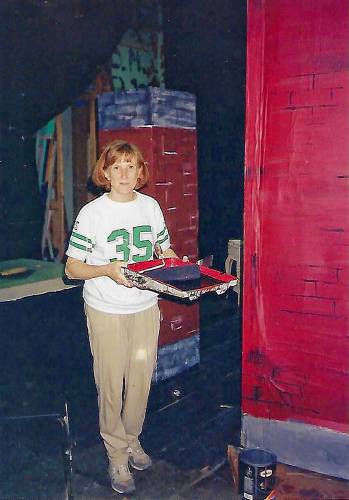 Susan Cohen paints a set at Hanover High School in 1996. (Family photograph)