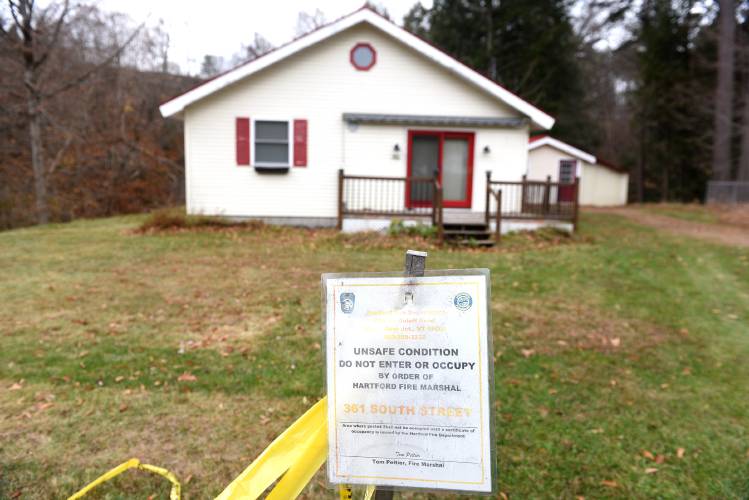 The Hartford selectboard is moving forward with a hazard-mitigation buyout grant for a residential property at 361 South St. in Wilder, Vt. The house will be razed, and the property mitigated for landslide risk, and then the town will own it. (Valley News-Jennifer Hauck)