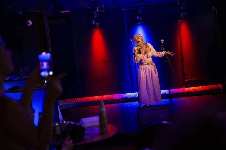 Amelia Rose, of Norwich, Vt., sings “vampire” by Olivia Rodrigo during karaoke night at Sawtooth Kitchen, Bar and Stage in Hanover, N.H., on Tuesday, Aug. 13, 2024. Karaoke is held at the bar every Tuesday from 8-11 p.m. (Valley News - Alex Driehaus) Copyright Valley News. May not be reprinted or used online without permission. Send requests to permission@vnews.com.