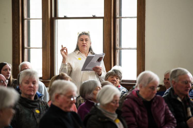 Anne Yates speaks in favor of an article that would repeal West Windsor's short-term rental ordinance at Town Meeting in Brownsville, Vt., on Tuesday, March 4, 2025. Yates said she started the petition that brought the issue before voters because she was surprised by the conditions of the ordinance after changing a property of hers from a long-term rental to a short-term rental last year. Voters declined to repeal the ordinance in a secret ballot vote at the meeting. (Valley News - James M. Patterson) Copyright Valley News. May not be reprinted or used online without permission. Send requests to permission@vnews.com.