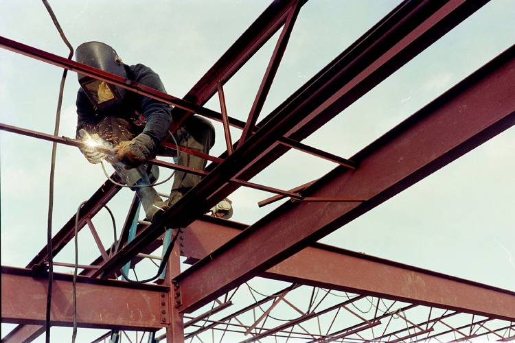 Gaylord Bard of BGM Inc. welds joists into place at the new Catamount Brewing Co. building in Windsor, Vt., on Jan. 7, 1997. The area will be used for retail space and a possible future restaurant. Construction on the building should be finished by April. Catamount is adding to the former Green Mountain Marble building in the Windsor Industrial Park off Route 5 on the north end of town. (Valley News - Geoff Hansen)