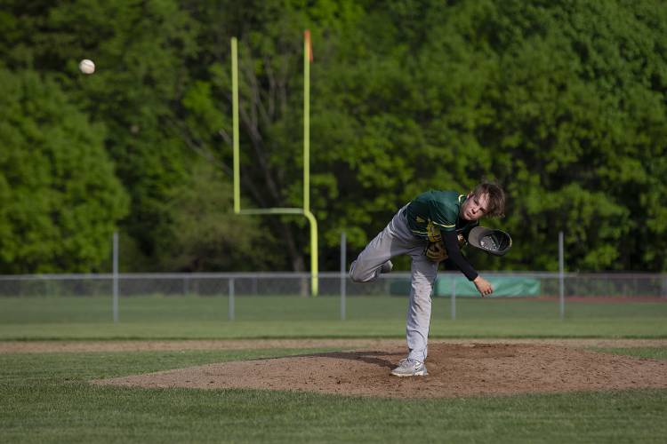 Windsor’s Alden Weld (4) loses his hat after throwing a pitch during a varsity baseball game against Woodstock at Windsor High School in Windsor, Vt., on Thursday, May 16, 2024. Woodstock won, 27-5. (Valley News / Report For America - Alex Driehaus) Copyright Valley News. May not be reprinted or used online without permission. Send requests to permission@vnews.com.