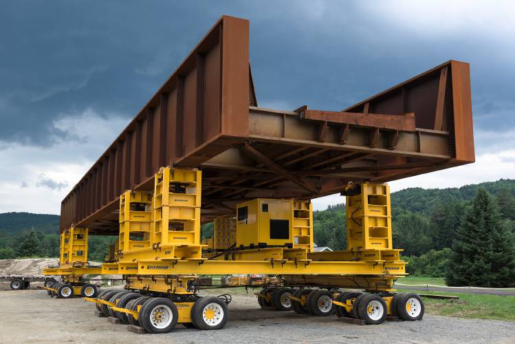 A 125 foot bridge waits to be moved into place for the New England Central Railroad overpass on Route 14 between Royalton Village and North Royalton, Vt., on July 5, 2024. During a 21 day road closure beginning on Tuesday, July 9, traffic will be detoured via Interstate 89 from Exit 4 in Royalton to Exit 3 in Sharon. (Valley News - James M. Patterson) Copyright Valley News. May not be reprinted or used online without permission. Send requests to permission@vnews.com.