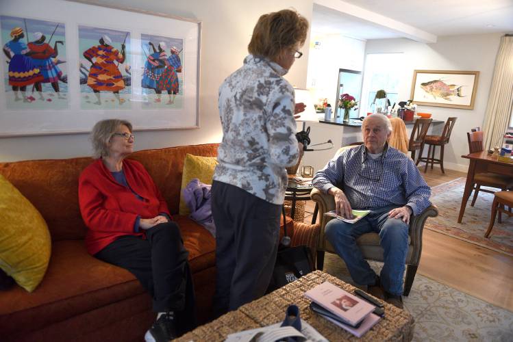 Lyme parish nurse Missy Ball talks with clients in their home in Lyme, N.H. on Monday, March 24, 2025. The program is supported by the Lyme Congregational Church. Free non-clinical health care support is available through the program to Lyme residents. (Valley News-Jennifer Hauck)