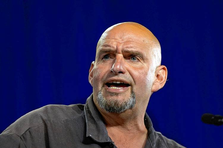 Sen. John Fetterman, D-Pa., speaks ahead of Democratic vice presidential candidate Minnesota Gov. Tim Walz during a campaign event in York, Pa., Wednesday, Oct. 2, 2024. (AP Photo/Matt Rourke)