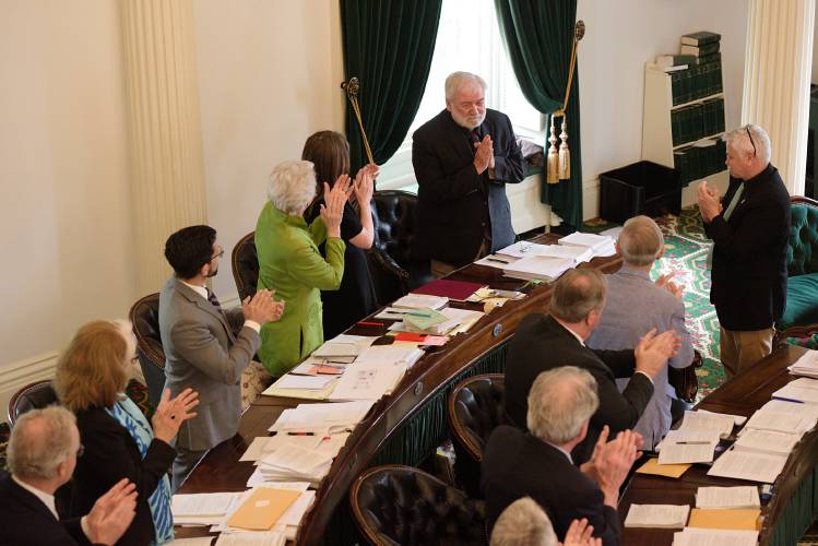 Sen. Dick McCormack, D-Windsor, of Bethel, 76, signals his thanks after a resolution honoring his 31 years of service in the Senate was read at the Statehouse in Montpelier, Vt., on Friday, May 10, 2024. McCormack was first appointed to his seat in 1989 by Gov. Madeleine Kunin and will not seek reelection this year. (Valley News - James M. Patterson) Copyright Valley News. May not be reprinted or used online without permission. Send requests to permission@vnews.com.