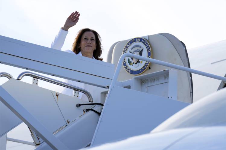 Democratic presidential nominee Vice President Kamala Harris waves as she boards Air Force Two at Savannah/Hilton Head International Airport in Savannah, Ga., Thursday, Aug. 29, 2024 after a bus tour and campaign rally. (AP Photo/Jacquelyn Martin)