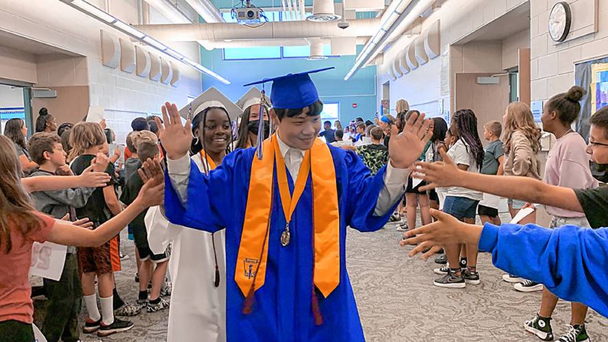 Middletown High School valedictorian Won Jang parades through the district's elementary schools with his Middletown, Del., graduating class in 2022. (Middletown High School photograph) 